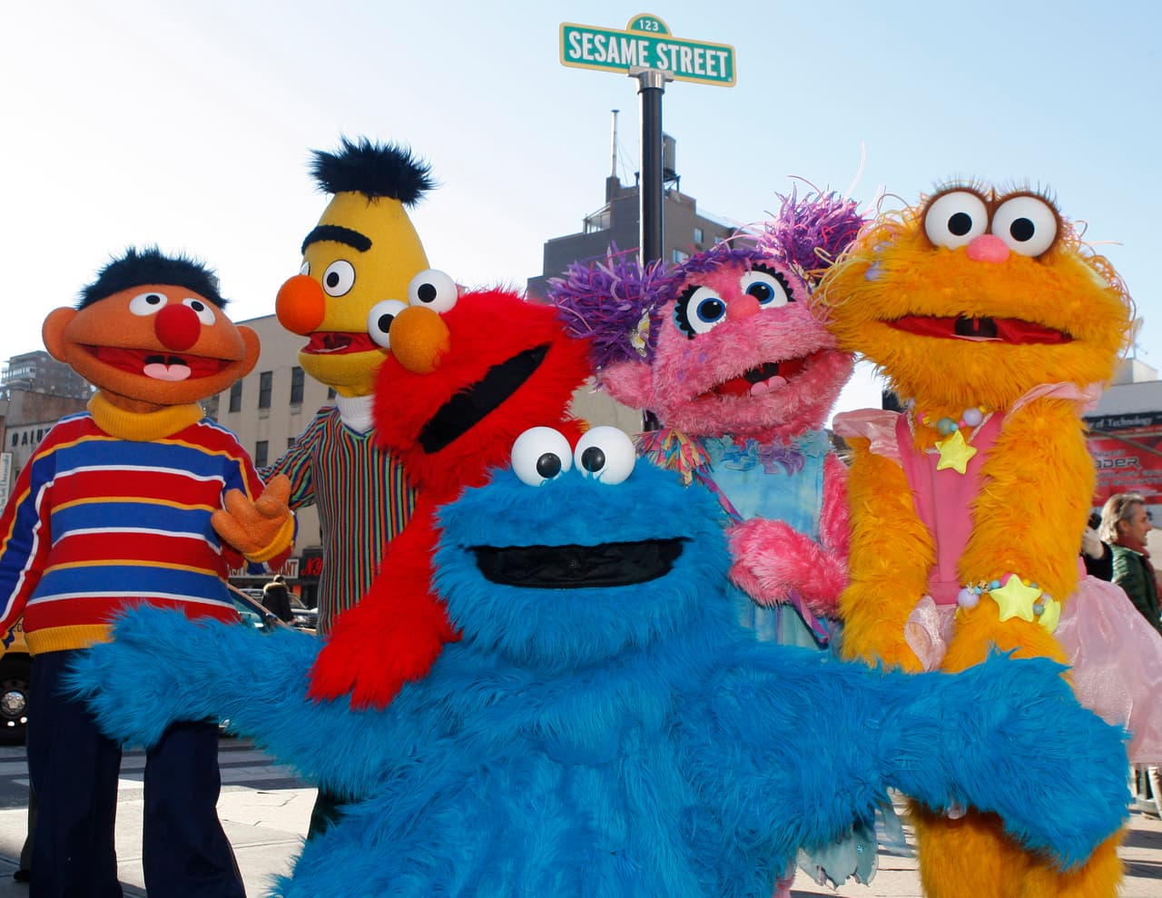 Characters from Sesame Street Live appear on the street by Madison Square Garden to celebrate the 30th anniversary of the live touring stage shows based on the PBS television series in New York, Thursday, Feb. 4, 2010. From left are Ernie, Bert, Elmo, Cookie Monster (foreground), Abby Cadabby, and Zoe. (AP Photo/Kathy Willens)