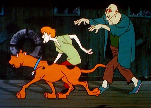 Scooby Doo ¿Dónde Estás? se estrenó en la televisión de Estados Unidos hace 50 años. Desde entonces hemos visto cómo los monstruos son, en realidad, menos peligrosos que la codicia humana.