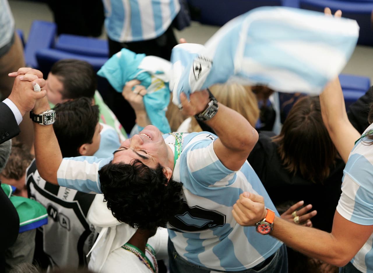 GELSENKIRCHEN, GERMANY - JUNE 16: Diego Maradona celebrates his team scoring a goal during the FIFA World Cup Germany 2006 Group C match between Argentina and Serbia & Montenegro at the Stadium Gelsenkirchen on June 16, 2006 in Gelsenkirchen, Germany. (Photo by Phil Cole/Getty Images)