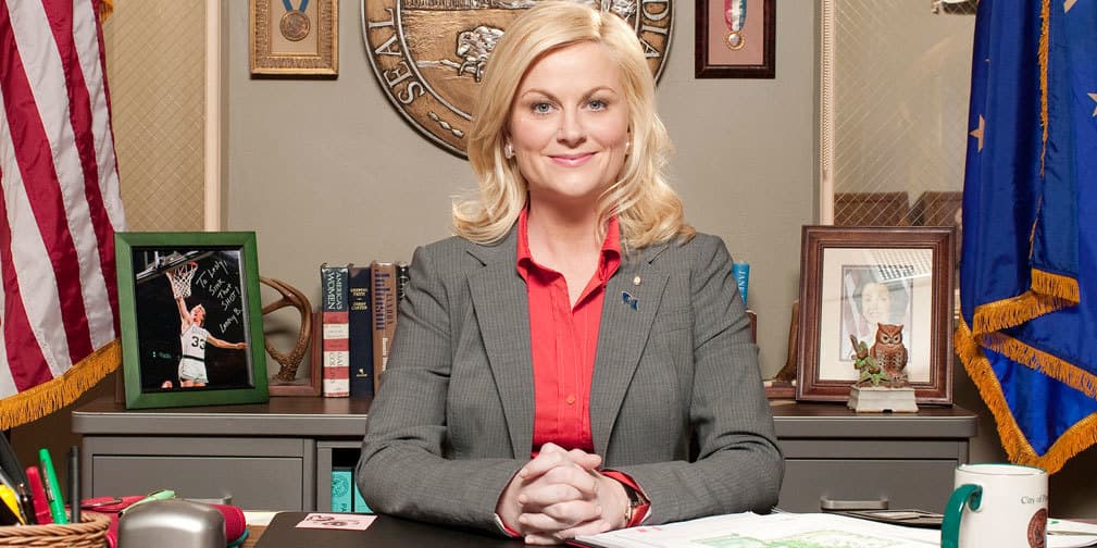 Amy Poehler por Leslie Knope en Parks and Recreation