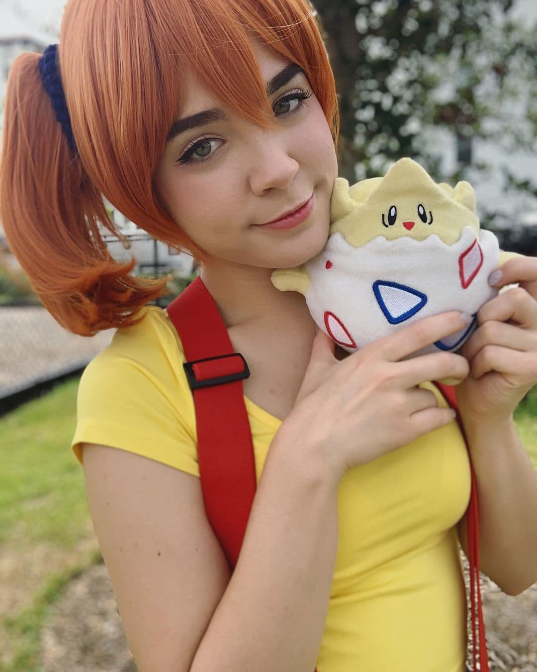 El puente entre los videojuegos y el anime lo hallamos en Misty, de Pokémon. Acompañada del adorable Togepi.