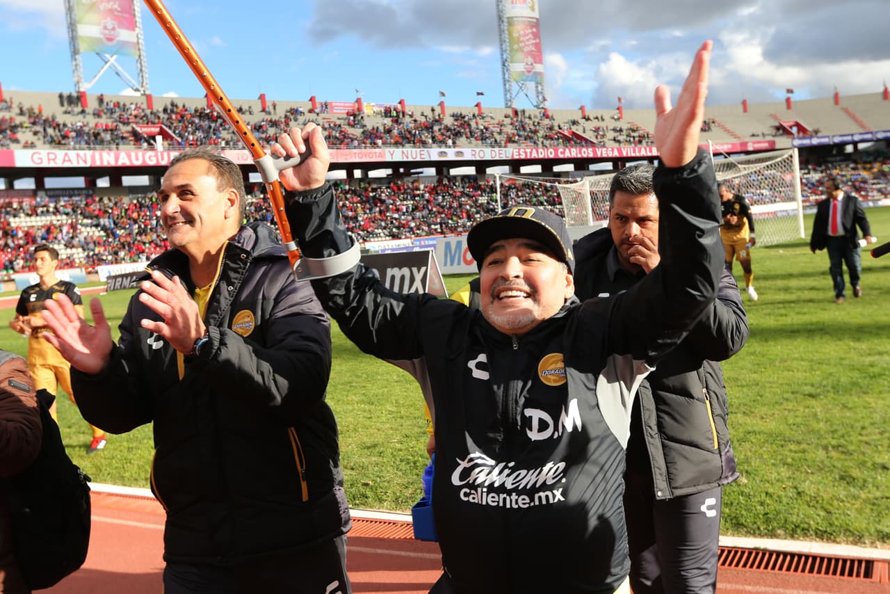 ZACATECAS, MEXICO - OCTOBER 20: Diego Armando Maradona coach of Dorados celebrates the victory of his team after the 12th round match between Mineros and Dorados as part of the Torneo Apertura 2018 Ascenso MX at Carlos Vega Villalba Stadium on October 20, 2018 in Zacatecas, Mexico. (Photo by Refugio Ruiz/Getty Images)